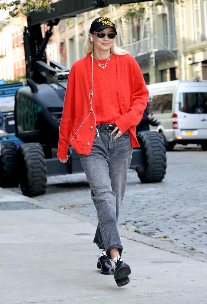 Guest In Residence founder Gigi Hadid in red jumper