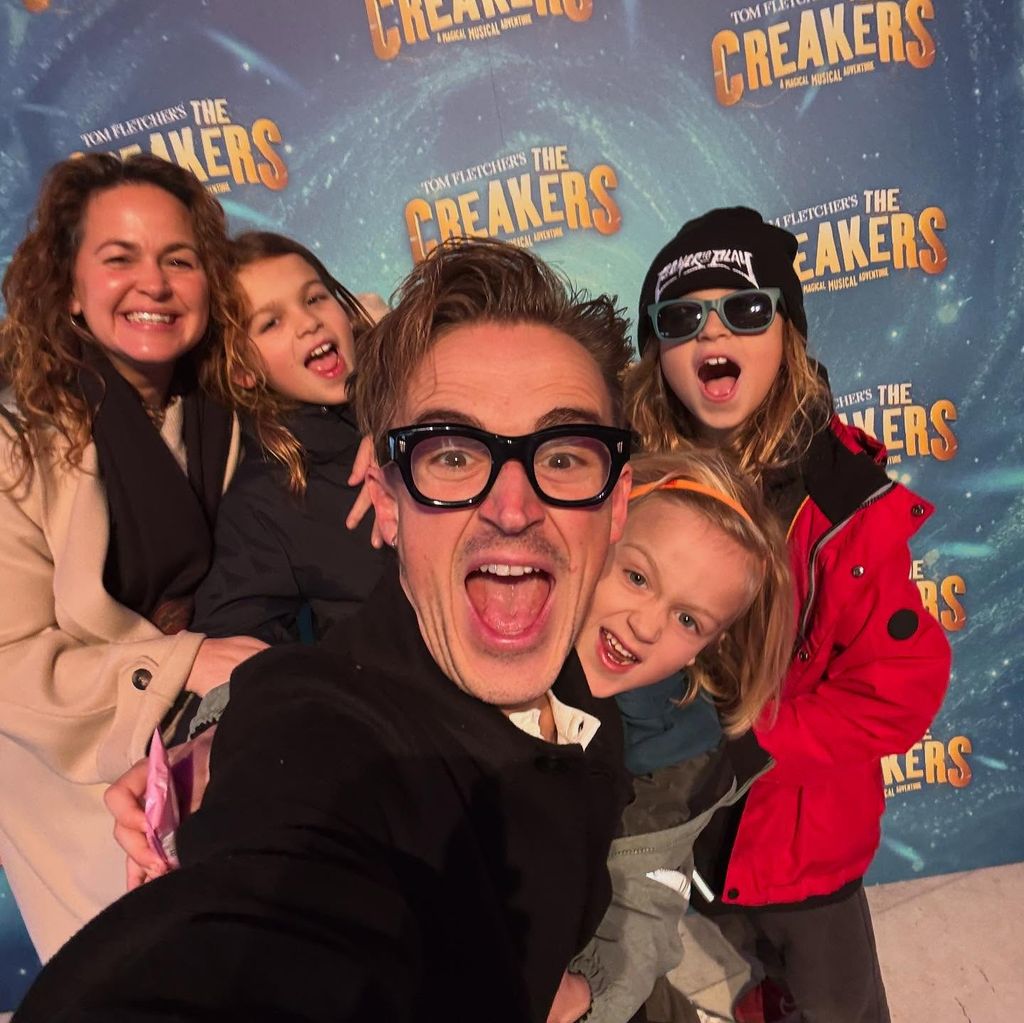 selfie of tom and giovanna fletcher with three sons