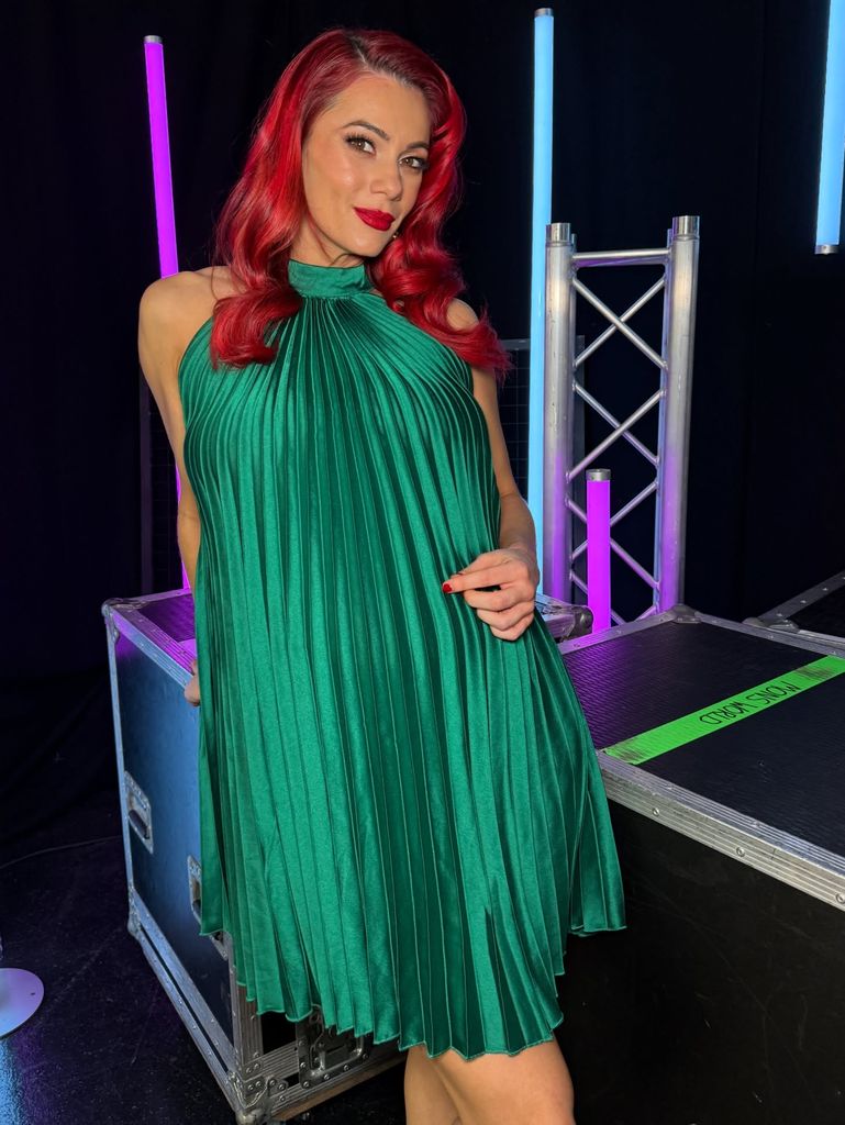 Dianne in emerald green dress backstage