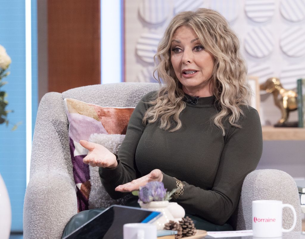 Carol Vorderman in a polo neck with waved hair