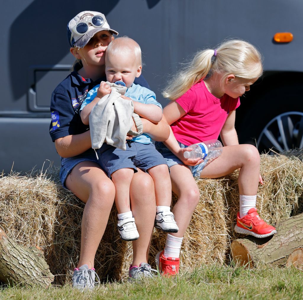 Mia Tindall, Lucas Tindall and Lena Tindall attend day 2 of the 2022 Festival of British Eventing at Gatcombe Park on August 6, 2022 in Stroud, England
