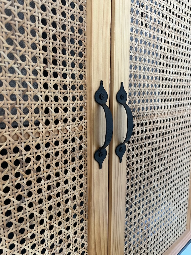 black handles on sugar cane cupboard 