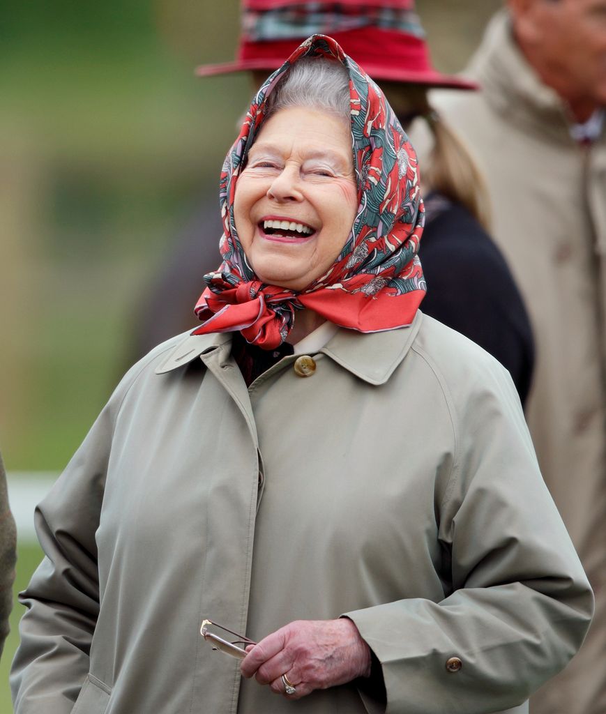 late queen laughing in headscarf