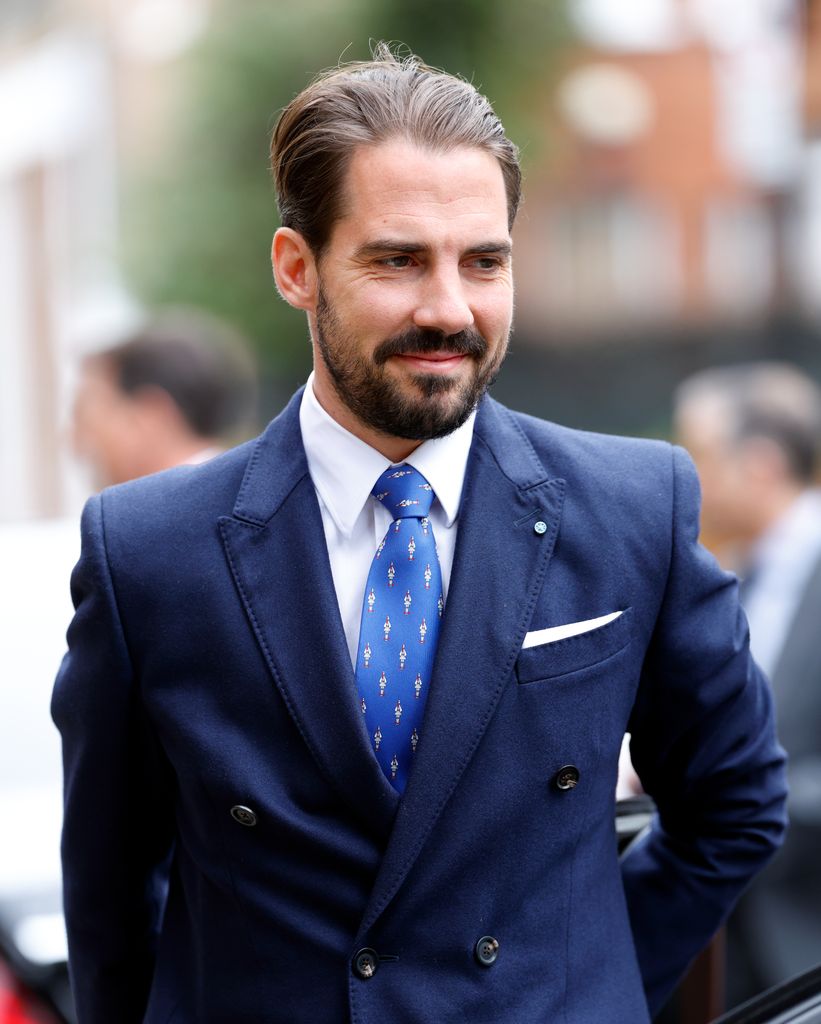 Prince Philippos in a blue suit