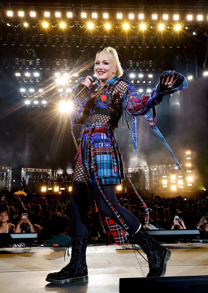 Gwen Stefani in plaid on stage at Coachella 
