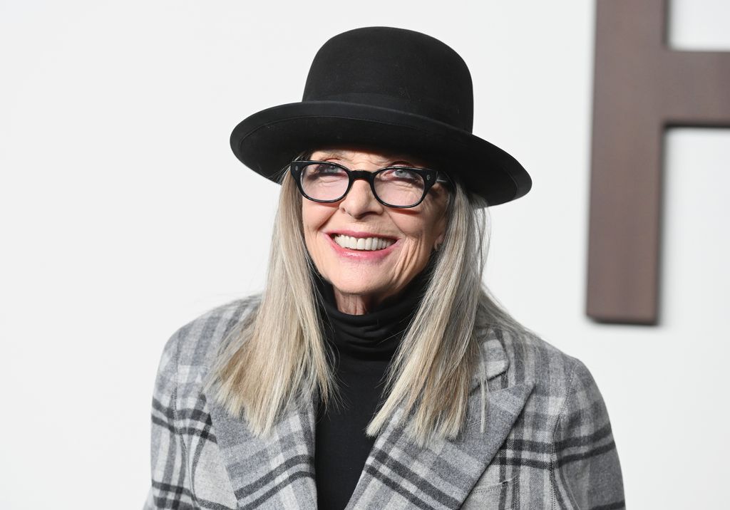 Diane Keaton hat and glasses smiling 