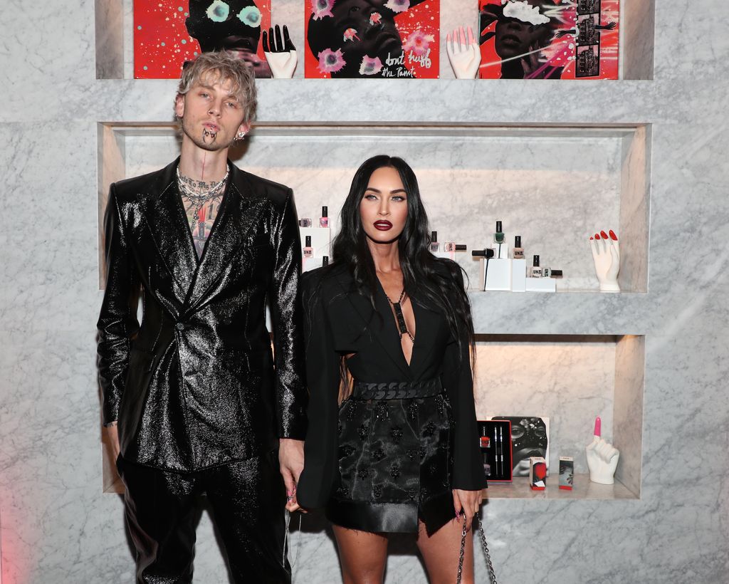 Machine Gun Kelly and Megan Fox in black