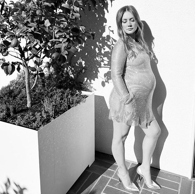 Pregnant Billie Lourd reveals baby bump in unexpected semi-sheer mini ...