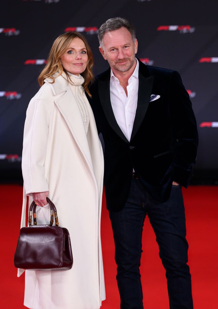 woman wearing white outfit and husband in suit and white shirt