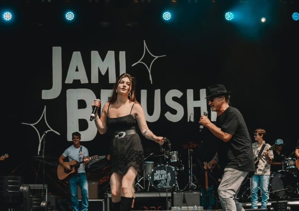 Jami Belushi on stage with her dad, Jim Belushi