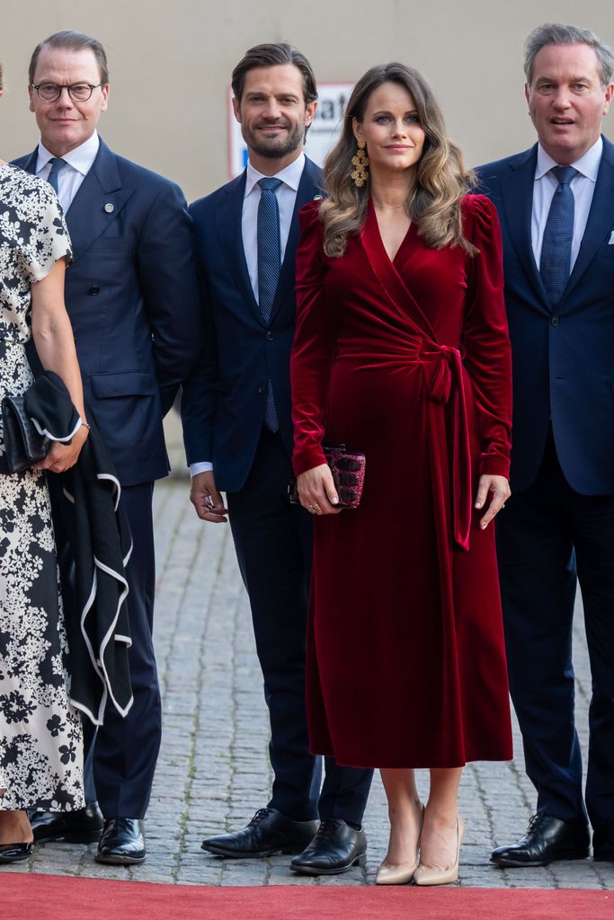 A photo of Princess Sofia wearing a red dress