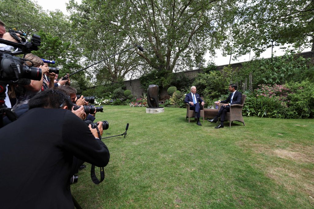 Former Prime Minister Rishi Sunak and US President Joe Biden sit in the garden of 10 Downing Street 