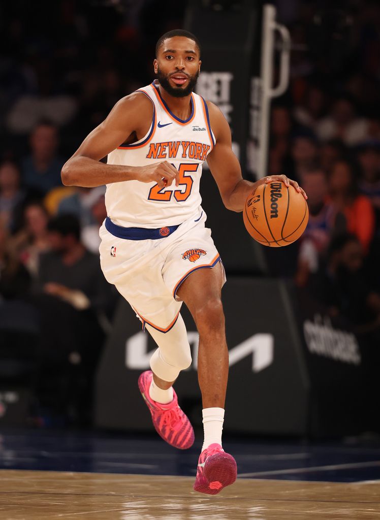 Mikal Bridges #25 of the New York Knicks dibbles the ball up court against the Cleveland Cavaliers