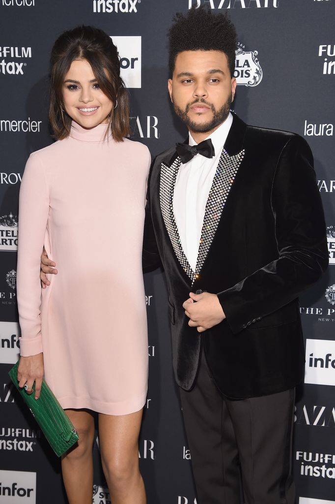 Selena Gomez and The Weeknd attending an event 