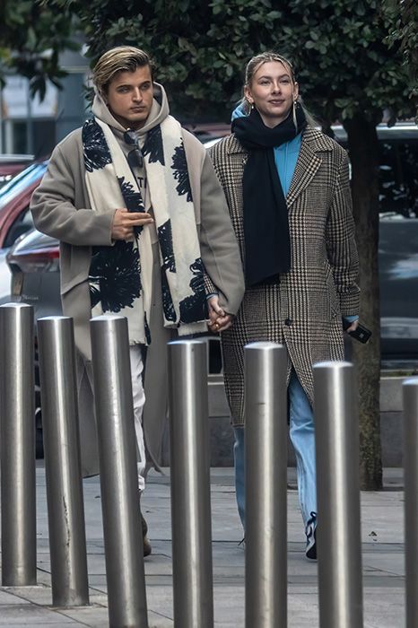 Nikita Kuzmin holds hands with Charlie Backshall in London