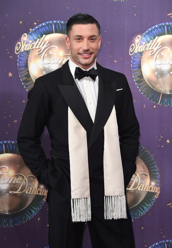 Giovanni Pernice in white and black suit