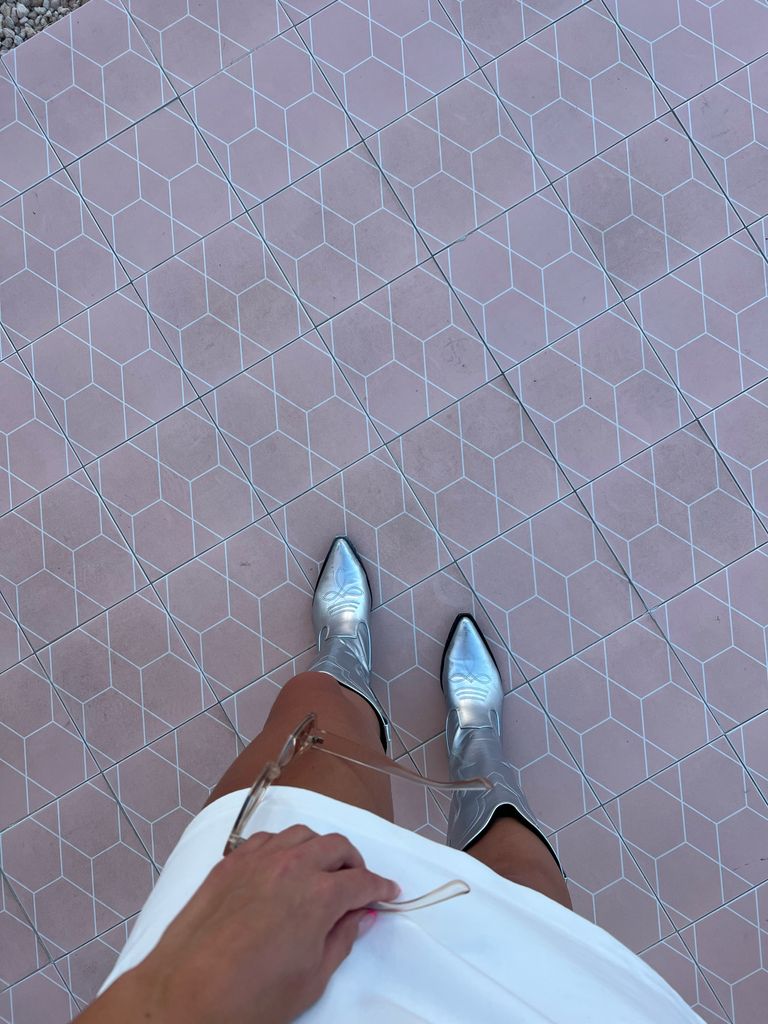These second-hand silver cowboy boots were bought on Vinted