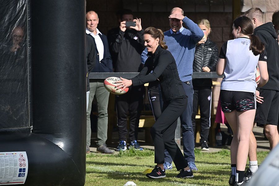 kate kicks rugby ball