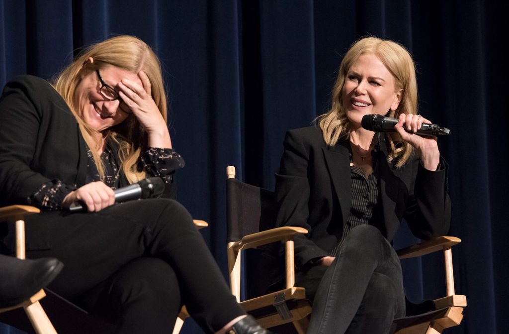 photo of bruna papandrea laughing while sitting beside nicole kidman