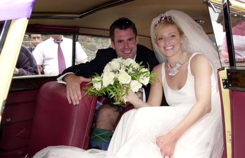 Gabby Logan and her husband Kenny in their wedding car