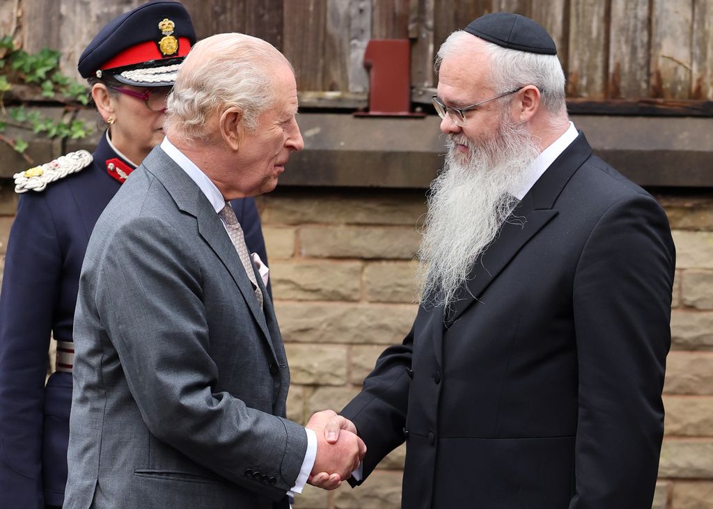 King Charles is greeted by Rabbi Daniel Walker during a visit to Heaton Park Hebrew Congregation Synagogue