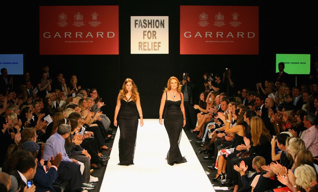 Sarah Ferguson and Princess Beatrice walk down the catwalk