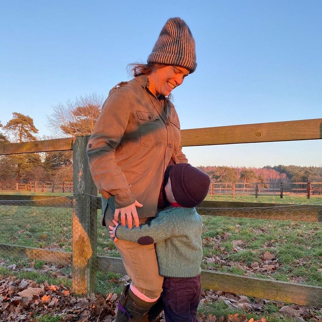 Princess Eugenie with her son, August, as he kisses her tummy