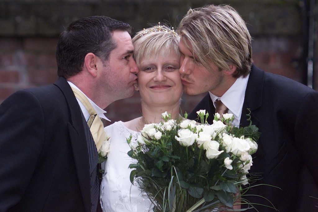 Lynne Beckham being kissed on the cheek by David Beckham on her wedding day