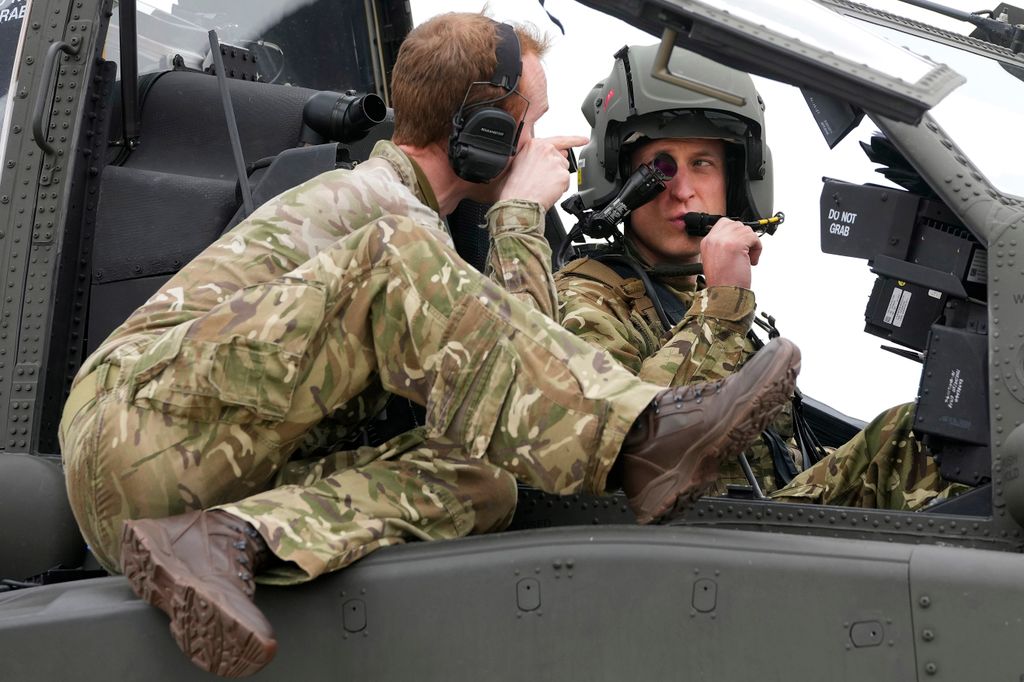 prince William sitting in an Apache helicopter