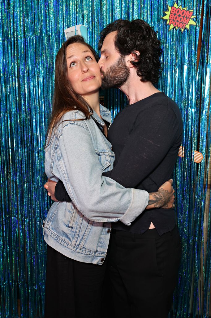 penn badgley kissing wife domino kirke on the cheek