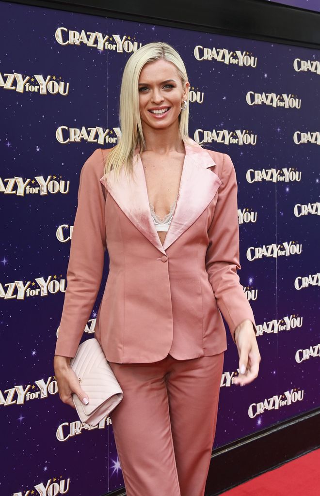 Nadiya Bychkova in peach-coloured blaxer and trousers