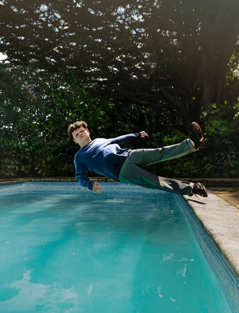 Dan Tiernan falling into a swimming pool
