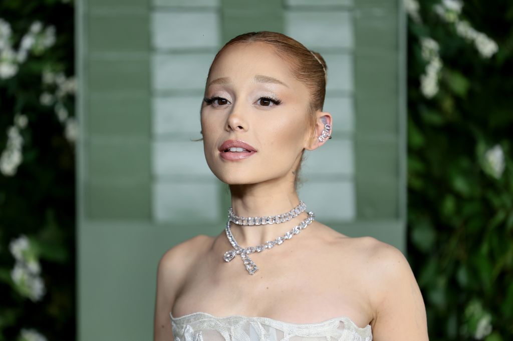 Ariana Grande up close in white strapless dress