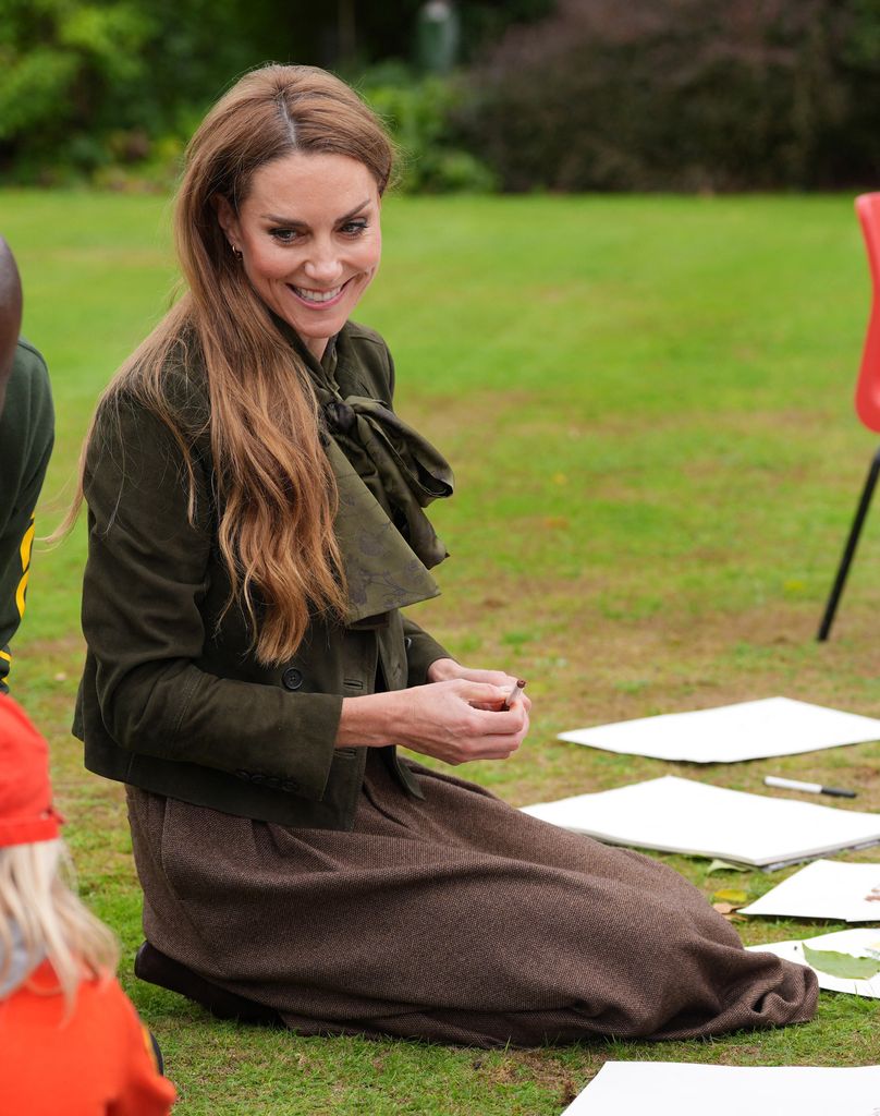 Britain's Catherine, Princess of Wales joins a group of Squirrels from the Scout Association taking part in activities at Frogmore Cottage on the Windsor Estate, in Windsor, on September 18, 2025