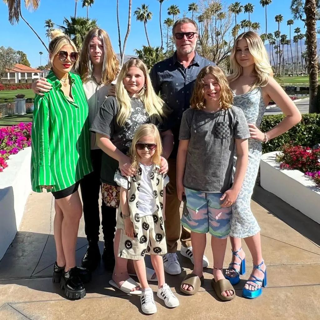 Tori with her five children and estranged husband Dean