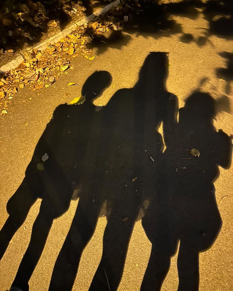 Jelena, Stefan and Tara Djokovic's shadows on the ground