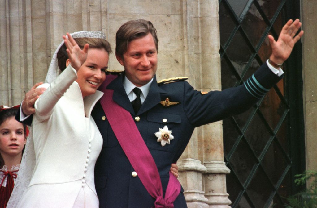 Prince Philippe of Belgium and Mathilde d'Udekem d'Acoz waving