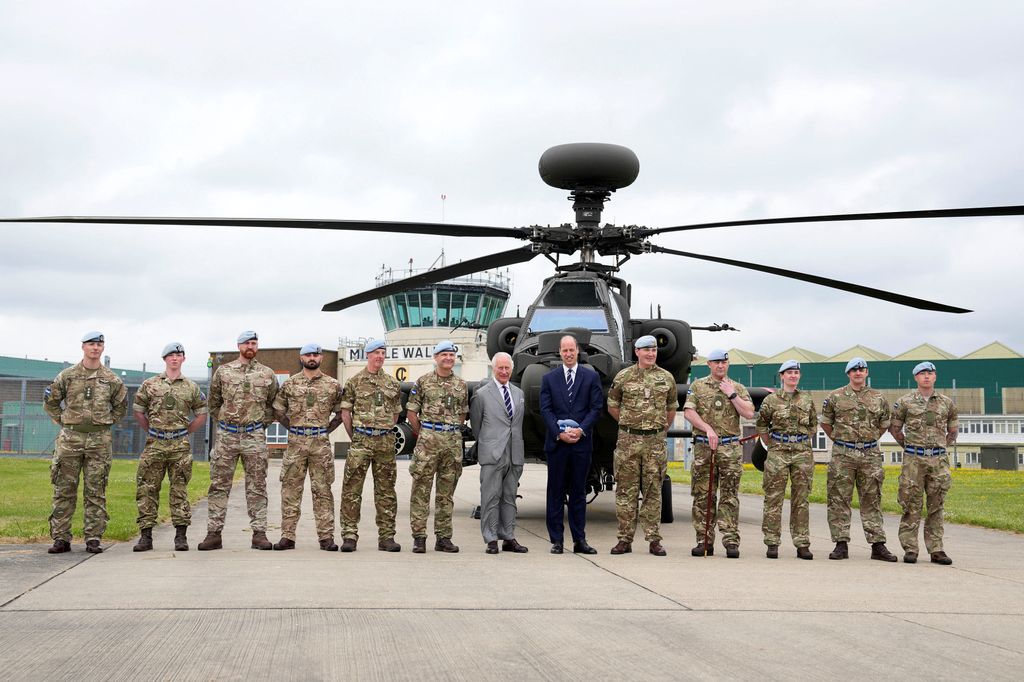 King Charles and Prince William pose for a group photo at Middle Wallop