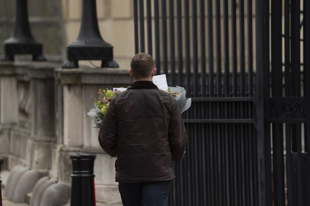 Flowers are delivered to Clarence House in London following the announcement of King Charles III's cancer diagnosis on Monday evening
