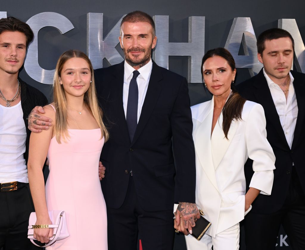 Harper Beckham, David Beckham and Victoria Beckham on red carpet