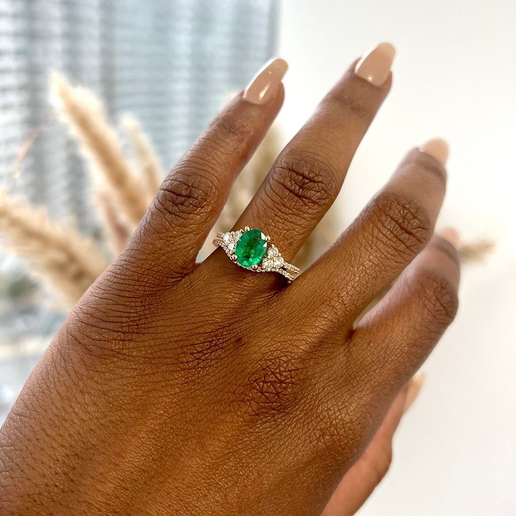 Hand with emerald ring