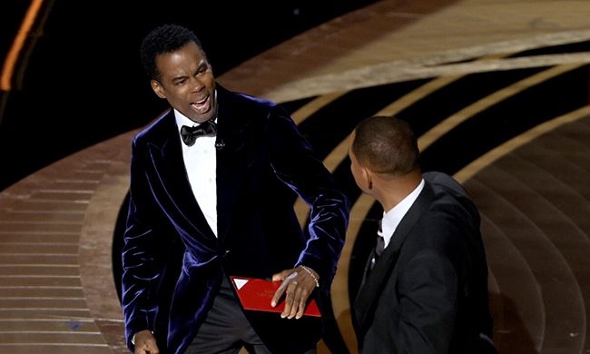 Will Smith slaps Chris Rock on stage at Oscars 2022