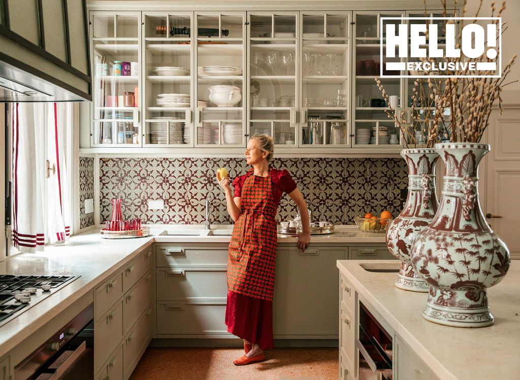 Giovanni and Servane Giol's palazzo in Venice - Servane pictured in kitchen with antique vases