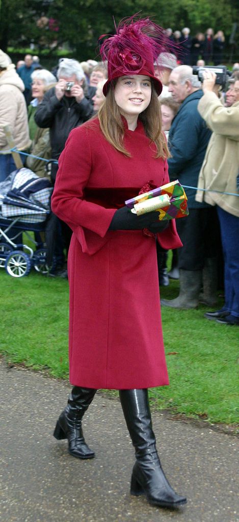 Princess Eugenie in a red coat aged 12