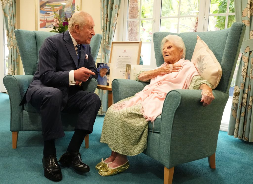 King Charles speaking to Ethel Caterham
