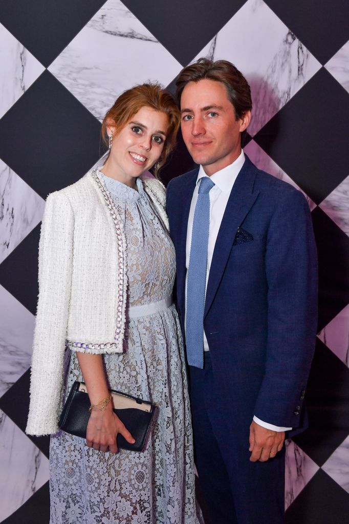 Prince Beatrice and Edoardo Mapelli Mozzi in front of a checkerboard background