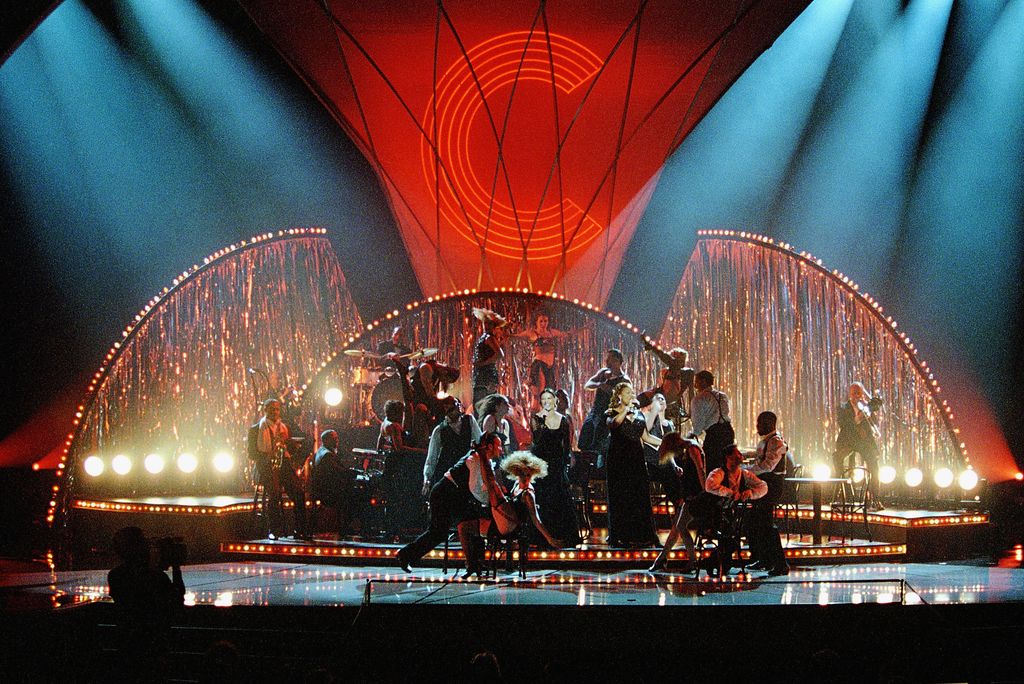 Catherine Zeta-Jones and co-star Queen Latifah (Center Right) perform music from Chicago during the 75th Annual Academy Awards