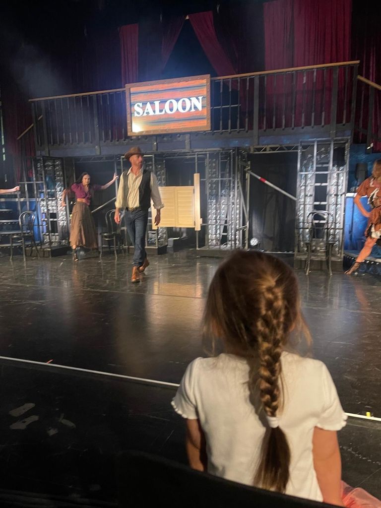 Ella Jordan watching her dad rehearse for his tour