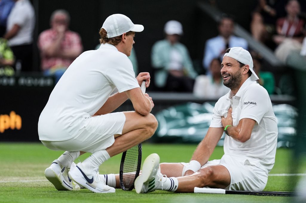dimitrov talking to sinner at wimbledon following injury