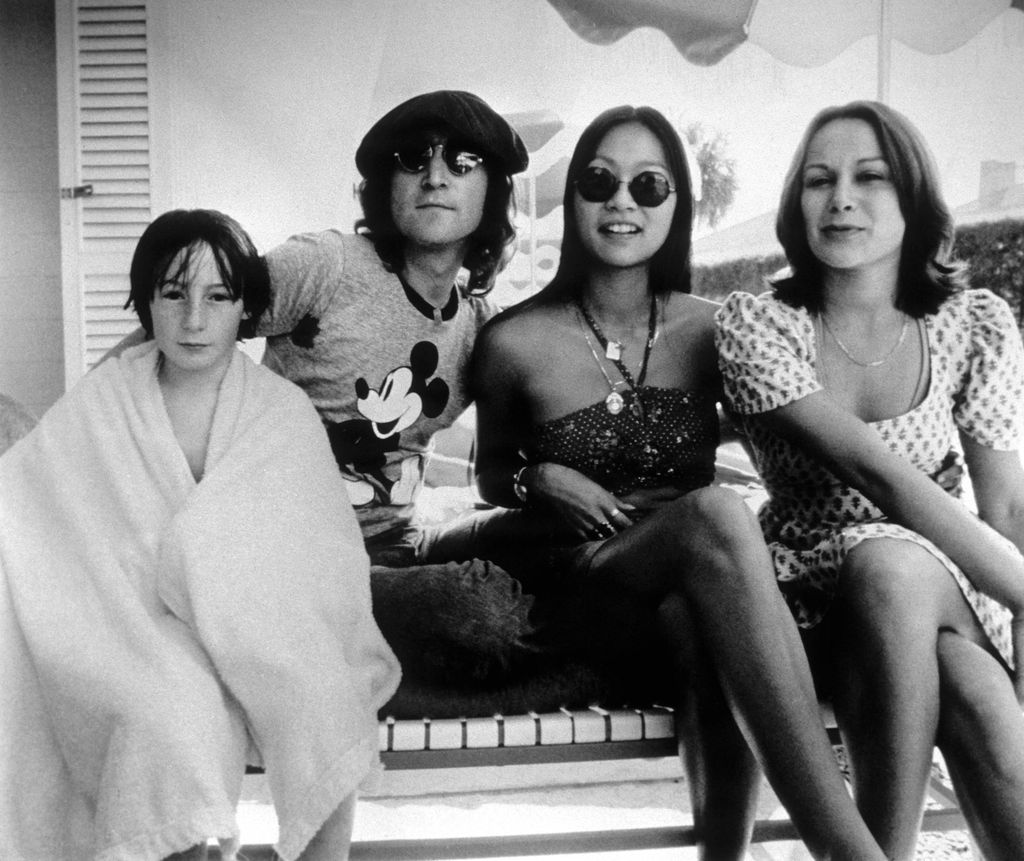 A boy, a man and two women sat down
